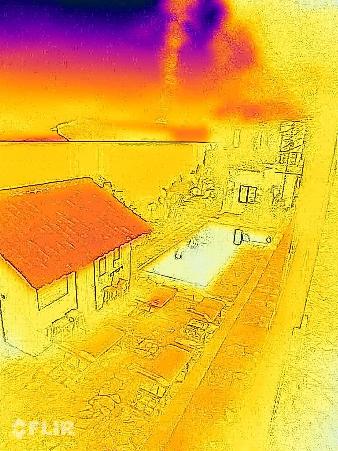 FLIR thermal image of a house, pool and garden taken with the Tank 5 Pro